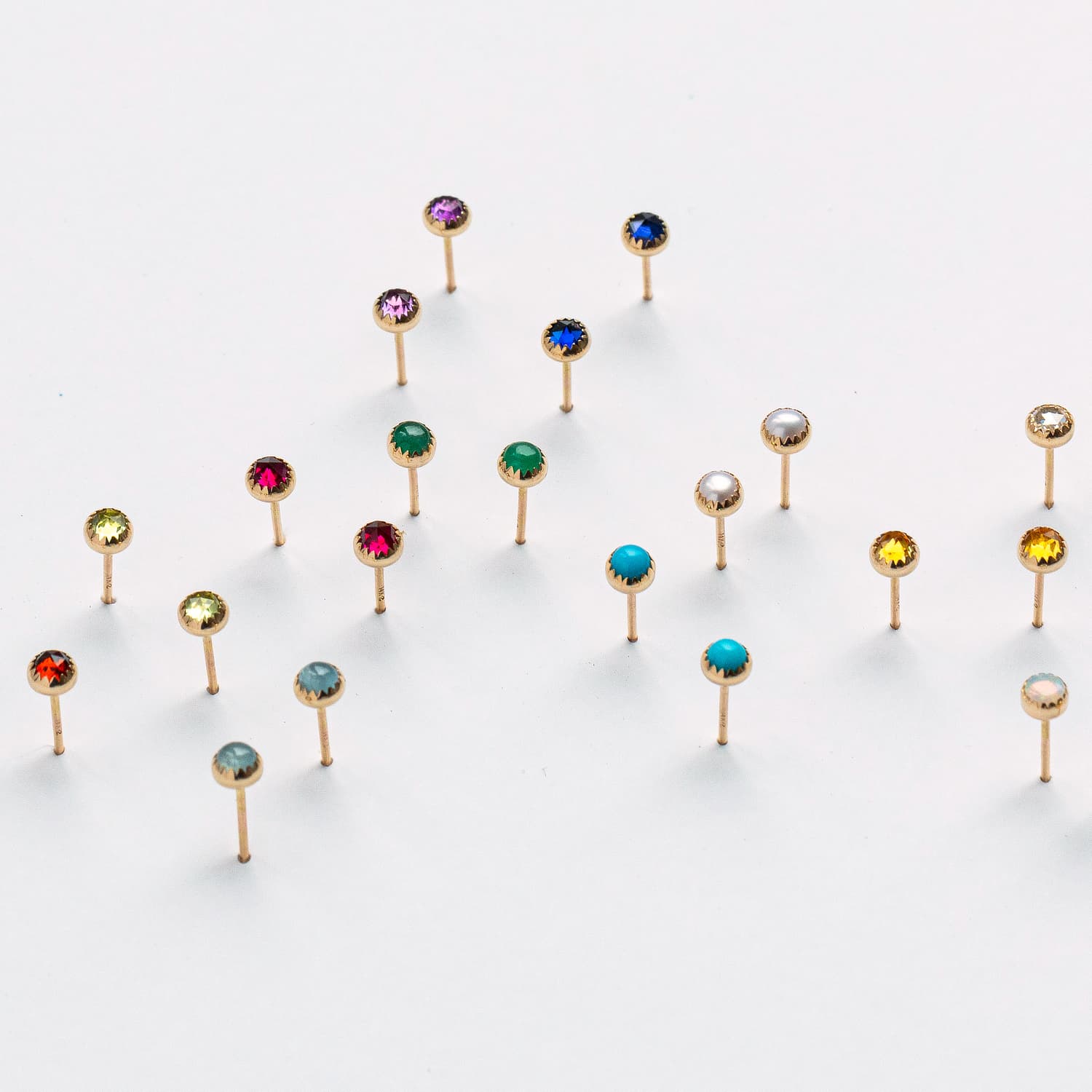 Handmade dainty stud earrings in solid gold and gemstones