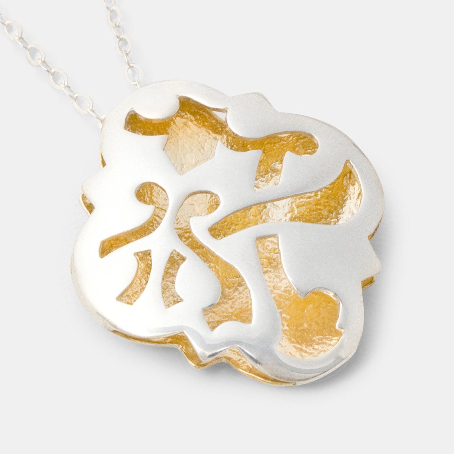 Quatrefoil pendant with gold - Simone Walsh Jewellery Australia