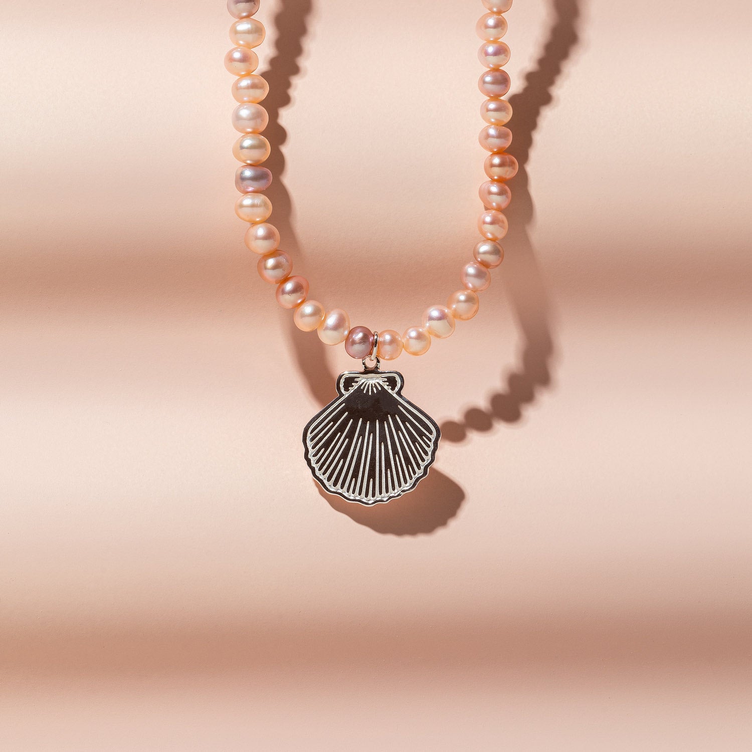 Fan shell pendant on peach pearl necklace - Simone Walsh Jewellery Australia